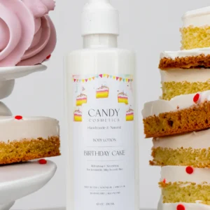 bottle of scented body lotion with slices of cake