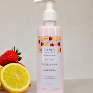 bottle of body lotion with lemons and strawberries in side